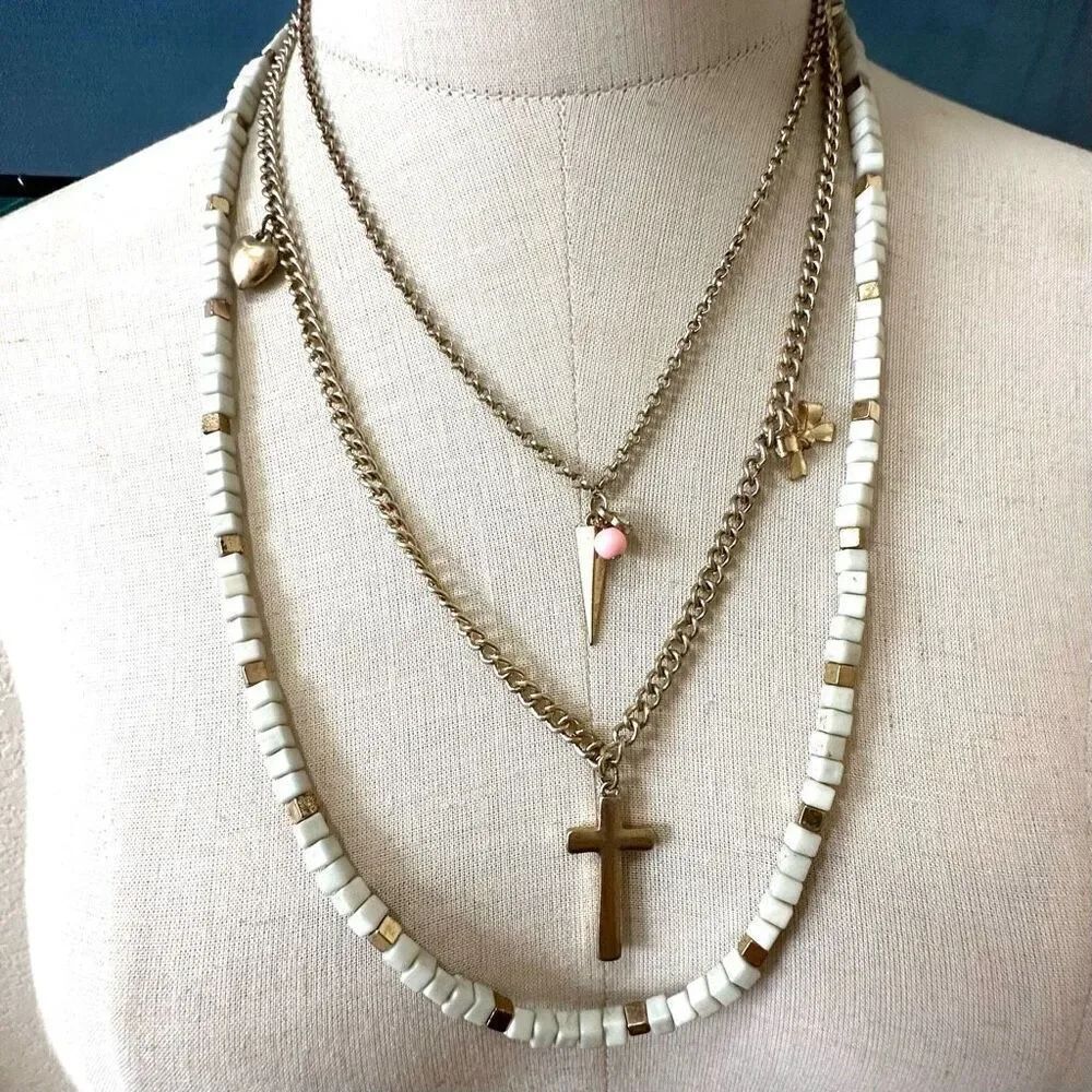 Gold tone beaded multi strand cross pendant necklace